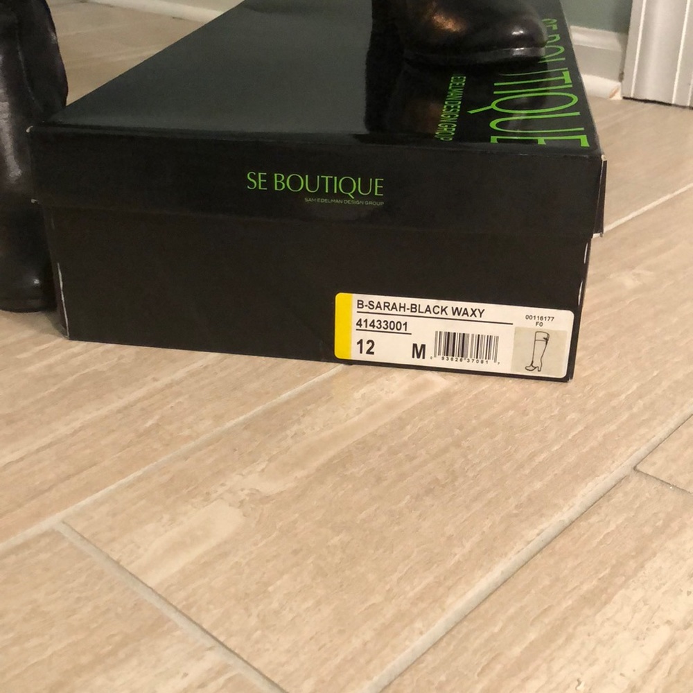 Tall black boots